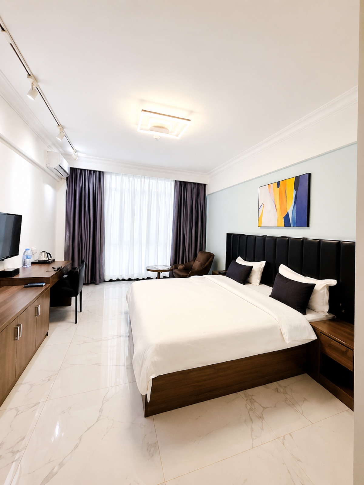 Chambre Deluxe — Hôtel 4 Saisons Bangui